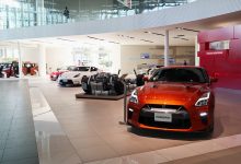 a car showroom filled with lots of cars